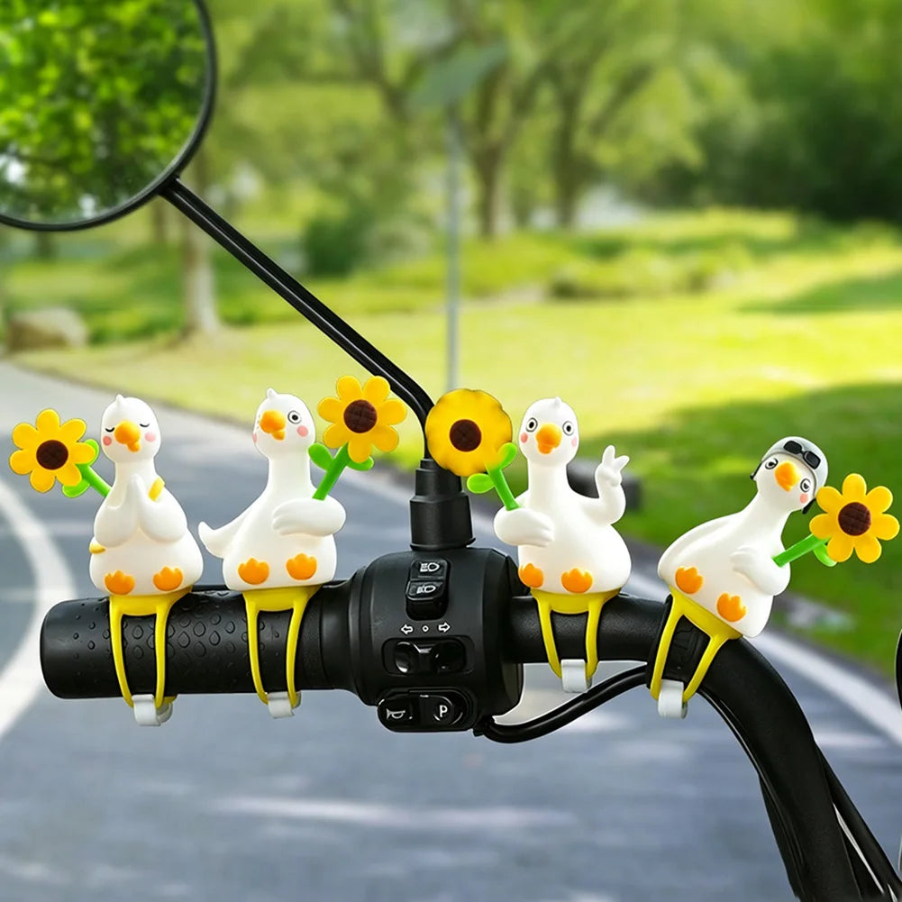 Decorazione girevole paperella e girasole – sul manubrio