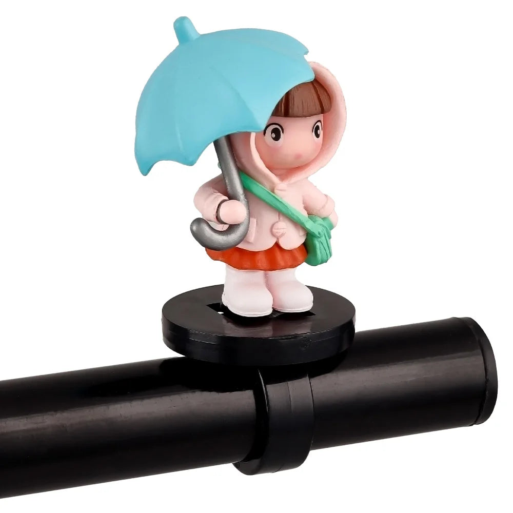 Menina com guarda-chuva decorativa – na bicicleta